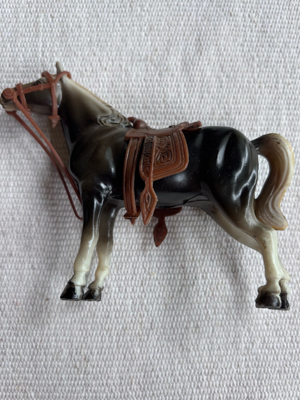 vintage plastic toy horse with saddle #2164 made in Hong Kong